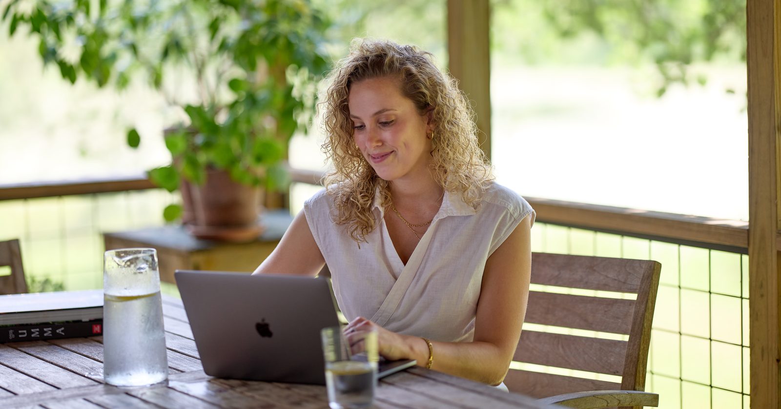 Nicole Randazzo, RDN, CDCES, writing at her laptop